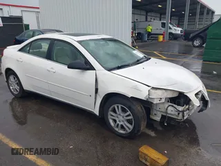 2006 Pontiac G6 6-Cyl z VIN 1G2ZG558364172091, wystawiony jako IAAI lot #42377332 z przebiegiem 199 495 mil mil oraz . Historia ofert i sprzedaży dostępna na DreamBid. Obrazek 1.