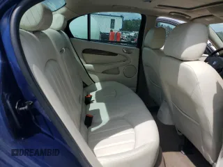 2004 Jaguar X-Type with VIN SAJEA51C44WD83361, listed as a Copart auction lot 55643545 with 54,615 mi miles and Salvage Title. Bid and sale history available at DreamBid. Image 10.