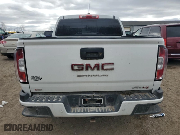 2021 GMC Canyon 4WD AT4 w/Cloth with VIN 1GTG6FEN9M1117578, listed as a Copart auction lot 78047114 with 64,955 mi miles and Salvage Title. Bid and sale history available at carsss.com. Image 6.