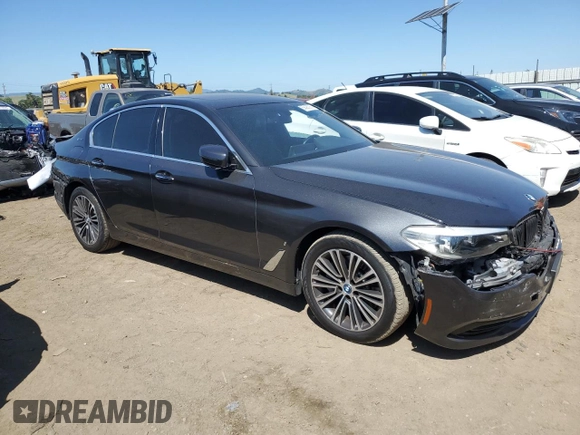 2018 BMW 5 Series 530e with VIN WBAJA9C52JB249402, listed as a Copart auction lot 55093055 with 117,033 mi miles and Salvage title. Bid and sale history available at DreamBid. Image 4.