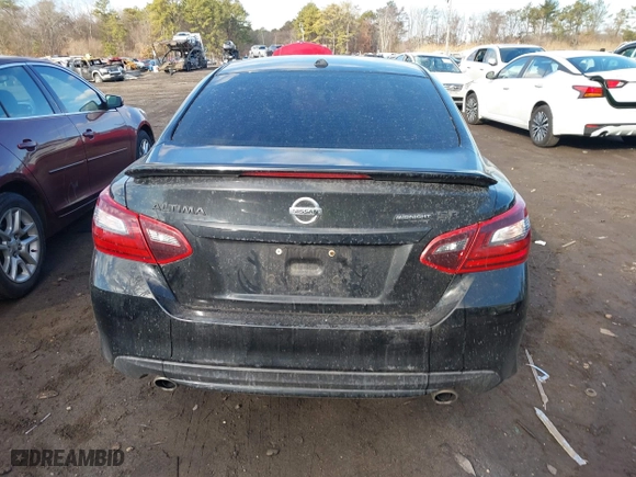 2018 Nissan Altima 2.5 SV with VIN 1N4AL3AP6JC244153, listed as a IAAI auction lot 41658699 with 54,486 mi miles. Bid and sale history available at carsss.com. Image 16.