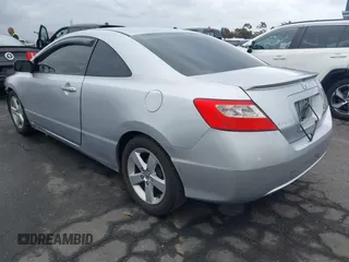 2009 Honda Civic Cpe LX with VIN 2HGFG12669H524342, listed as a IAAI auction lot 42061391 with 162,369 mi miles. Bid and sale history available at carsss.com. Image 3.