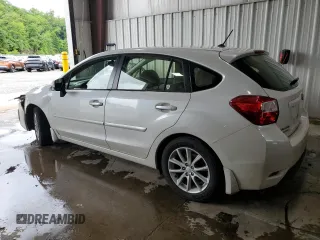 2012 Subaru Impreza Premium with VIN JF1GPAC6XCH246534, listed as a Copart auction lot 61001935 with 141,728 mi miles and Salvage title. Bid and sale history available at DreamBid. Image 2.