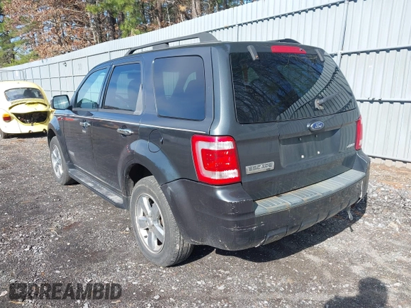 2008 Ford Escape XLT with VIN 1FMCU93108KA52105, listed as a IAAI auction lot 41887169 with 137,539 mi miles. Bid and sale history available at carsss.com. Image 3.