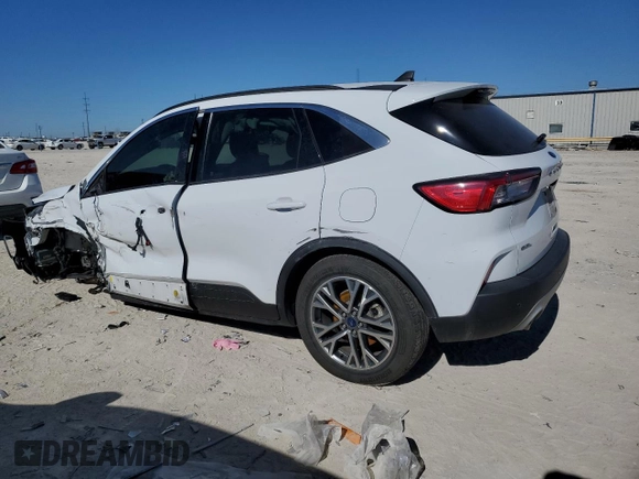 2021 Ford Escape SEL Hybrid z VIN 1FMCU0CZ5MUA52570, wystawiony jako Copart lot #42097635 z przebiegiem 105 059 mil mil oraz Czysty tytuł • Clean title. Historia ofert i sprzedaży dostępna na DreamBid. Obrazek 2.