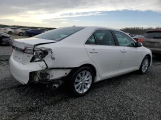 2014 Toyota Camry SE with VIN 4T1BK1FK2EU542746, listed as a Copart auction lot 48057825 with 112,547 mi miles and Salvage Title. Bid and sale history available at carsss.com. Image 3.