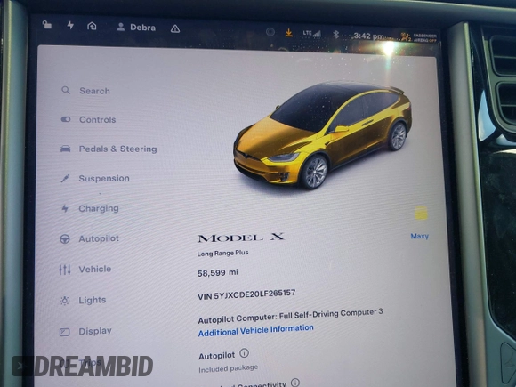 2020 Tesla Model X Long Range with VIN 5YJXCDE20LF265157, listed as a IAAI auction lot 41809572 with 58,599 mi miles. Bid and sale history available at carsss.com. Image 7.
