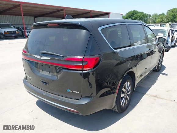 2023 Chrysler Pacifica Hybrid Touring L with VIN 2C4RC1L77PR540958, listed as a IAAI auction lot 42010484 with 61,166 mi miles. Bid and sale history available at carsss.com. Image 4.
