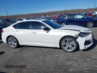 2021 Acura TLX Technology z VIN 19UUB6F41MA006805, wystawiony jako IAAI lot #41869747 z przebiegiem 59 228 mil mil oraz . Historia ofert i sprzedaży dostępna na DreamBid. Obrazek 14.