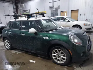 2015 MINI Hardtop 4 Door S z VIN WMWXU3C55FT892293, wystawiony jako IAAI lot #41359066 z przebiegiem 112 704 mil mil oraz . Historia ofert i sprzedaży dostępna na DreamBid. Obrazek 6.