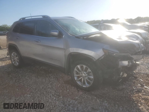 2019 Jeep Cherokee Latitude with VIN 1C4PJLCX4KD110812, listed as a Copart auction lot 52508065 with 126,861 mi miles and Salvage title. Bid and sale history available at DreamBid. Image 4.