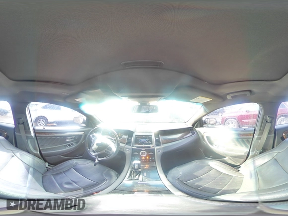 2014 Ford Taurus Limited z VIN 1FAHP2J88EG177883, wystawiony jako Copart lot #56119255 z przebiegiem 141 743 mil mil oraz Szkoda całkowita • Salvage title. Historia ofert i sprzedaży dostępna na DreamBid. Obrazek 14.
