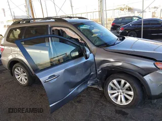 2011 Subaru Forester X Limited with VIN JF2SHAEC5BH757458, listed as a IAAI auction lot 41059097 with 133,662 mi miles and . Bid and sale history available at DreamBid. Image 6.