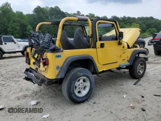 2000 Jeep Wrangler Sport with VIN 1J4FA49SXYP789791, listed as a Copart auction lot 60538875 with Not provided miles and Salvage title. Bid and sale history available at DreamBid. Image 3.