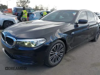2019 BMW 5 Series 530i with VIN WBAJA5C54KWW45379, listed as a IAAI auction lot 41276092 with 77,025 mi miles. Bid and sale history available at carsss.com. Image 17.