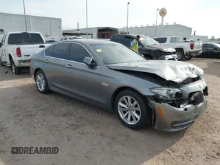 2014 BMW 5 Series 528i with VIN WBA5A5C52ED500696, listed as a IAAI auction lot 41708462 with 121,592 mi miles. Bid and sale history available at carsss.com. Image 1.