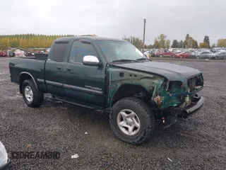 2000 Toyota Tundra SR5 with VIN 5TBBT4410YS016064, listed as a IAAI auction lot 40748828 with 228,435 mi miles and . Bid and sale history available at DreamBid. Image 1.