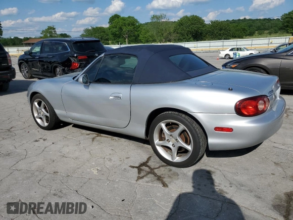 2003 Mazda MX-5 Miata Cloth with VIN JM1NB353230312510, listed as a Copart auction lot 54925895 with 141,391 mi miles and Salvage Title. Bid and sale history available at DreamBid. Image 2.