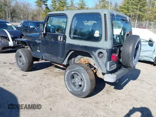 2001 Jeep Wrangler Sport with VIN 1J4FA49S61P357348, listed as a IAAI auction lot 41938170 with 177,356 mi miles. Bid and sale history available at carsss.com. Image 3.