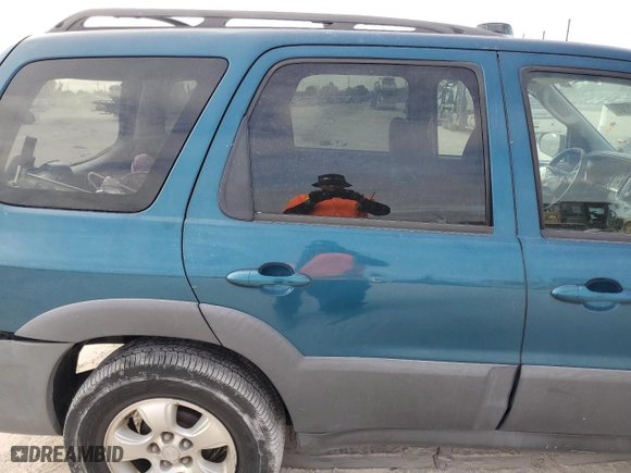 2005 Mazda Tribute i with VIN 4F2YZ02Z35KM11408, listed as a Copart auction lot 87746585 with 194,034 mi miles and Salvage Title. Bid and sale history available at carsss.com. Image 11.