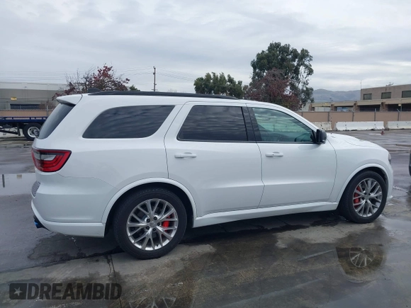 2018 Dodge Durango SRT with VIN 1C4SDJGJ5JC262338, listed as a IAAI auction lot 41106320 with 89,046 mi miles and . Bid and sale history available at DreamBid. Image 13.