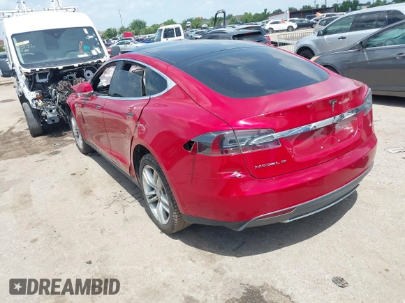 2014 Tesla Model S 60 with VIN 5YJSA1H14EFP63897, listed as a IAAI auction lot 42713272 with Not provided miles and . Bid and sale history available at DreamBid. Image 3.