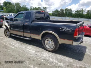 2000 Ford F-150 XL z VIN 1FTRX18L7YNB44005, wystawiony jako Copart lot #56535195 z przebiegiem 187 429 mil mil oraz Szkoda całkowita • Salvage title. Historia ofert i sprzedaży dostępna na DreamBid. Obrazek 2.