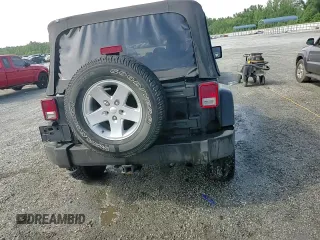 2014 Jeep Wrangler Sport z VIN 1C4AJWAG0EL147523, wystawiony jako Copart lot #59682015 z przebiegiem 196 258 mil mil oraz Szkoda całkowita • Salvage title. Historia ofert i sprzedaży dostępna na DreamBid. Obrazek 13.