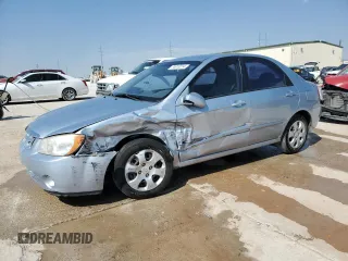 2006 Kia Spectra EX with VIN KNAFE121865277527, listed as a Copart auction lot 74613214 with 123,368 mi miles and Salvage Title. Bid and sale history available at carsss.com. Image 1.