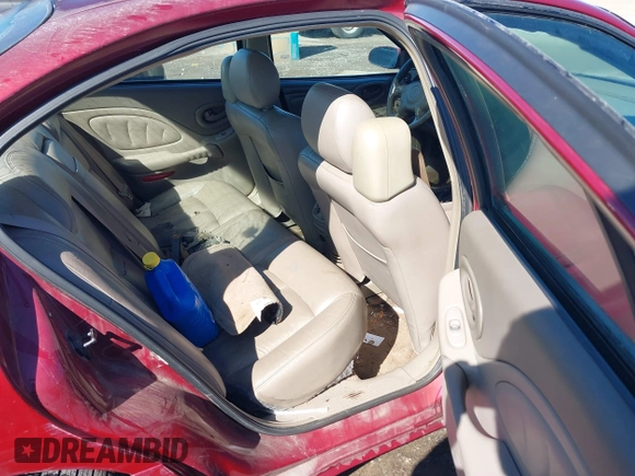 2003 Pontiac Bonneville SLE z VIN 1G2HY52K534159881, wystawiony jako IAAI lot #41604988 z przebiegiem 227 097 mil mil oraz . Historia ofert i sprzedaży dostępna na DreamBid. Obrazek 8.