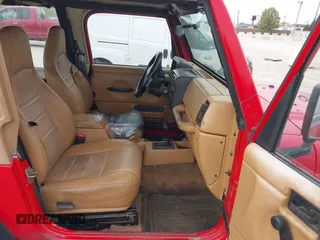 1998 Jeep Wrangler Sport with VIN 1J4FY19SXWP751159, listed as a IAAI auction lot 42195091 with 155,996 mi miles and . Bid and sale history available at DreamBid. Image 5.