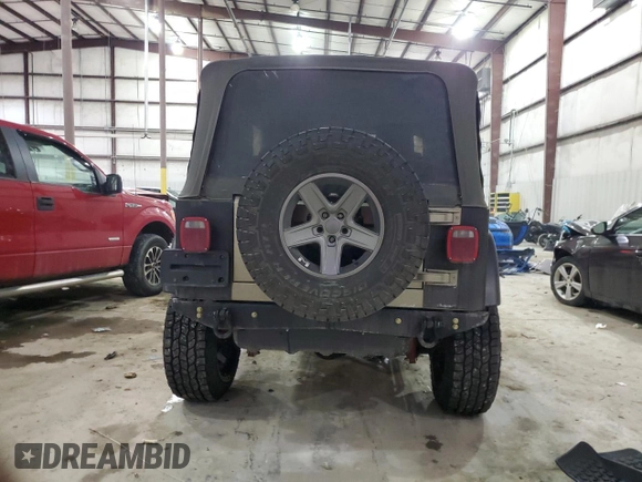 2003 Jeep Wrangler Rubicon z VIN 1J4FA69S13P345591, wystawiony jako Copart lot #41741685 z przebiegiem 85 335 mil mil oraz Szkoda całkowita • Salvage title. Historia ofert i sprzedaży dostępna na DreamBid. Obrazek 6.