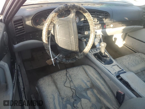 1995 Porsche 968 z VIN WP0AA296XSS820274, wystawiony jako Copart lot #74589074 z przebiegiem Nie podano mil oraz Szkody całkowita. Historia ofert i sprzedaży dostępna na DreamBid. Obrazek 8.