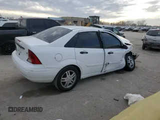 2003 Ford Focus SE with VIN 1FAFP34P93W246292, listed as a Copart auction lot 84111594 with Not Provided miles and Salvage Title. Bid and sale history available at carsss.com. Image 3.