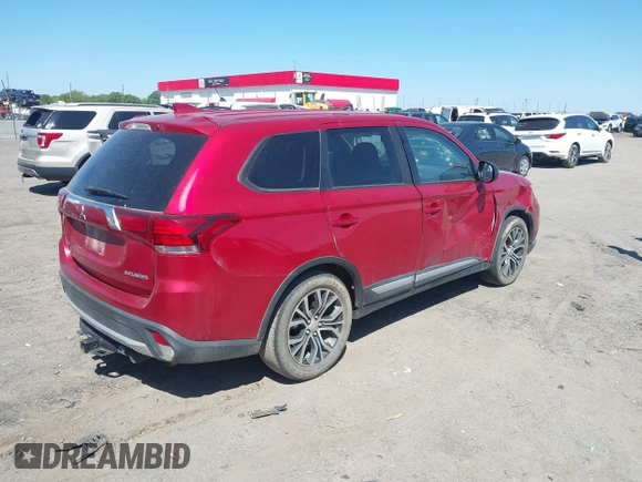 2018 Mitsubishi Outlander ES with VIN JA4AD2A33JZ040254, listed as a IAAI auction lot 42044855 with 141,230 mi miles and . Bid and sale history available at DreamBid. Image 4.
