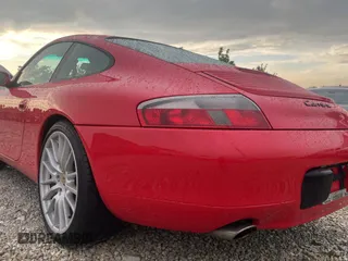 1999 Porsche 911 z VIN WP0AA2991XS620689, wystawiony jako Copart lot #59999925 z przebiegiem 152 508 mil mil oraz Czysty tytuł • Clean title. Historia ofert i sprzedaży dostępna na DreamBid. Obrazek 3.