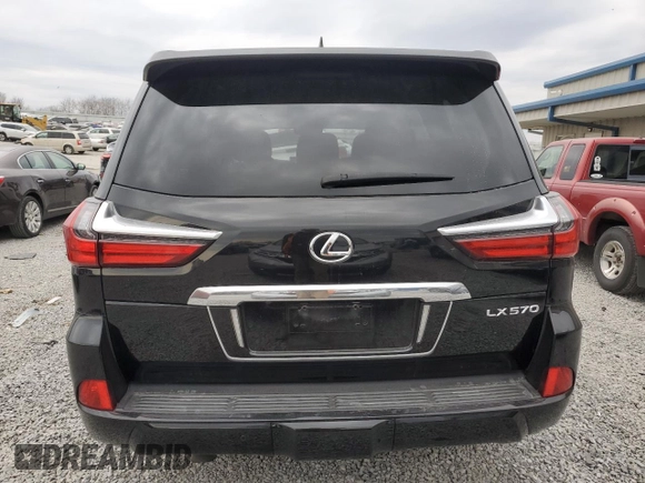 2019 Lexus LX 570 with VIN JTJHY7AX7K4310302, listed as a Copart auction lot 82034744 with 96,980 mi miles and Salvage title. Bid and sale history available at DreamBid. Image 6.