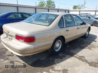 1996 Chevrolet Caprice Classic 1SA Special Value Pkg with VIN 1G1BL52P9TR190980, listed as a IAAI auction lot 42019775 with 135,432 mi miles. Bid and sale history available at carsss.com. Image 4.