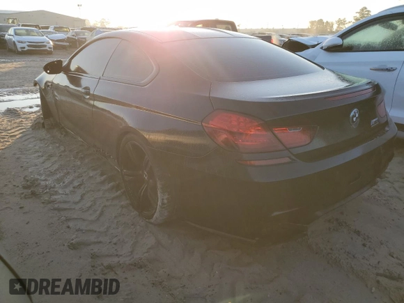 2017 BMW M6 z VIN WBS6J9C3XHD934858, wystawiony jako Copart lot #73714104 z przebiegiem Nie podano mil oraz Szkoda całkowita • Salvage title. Historia ofert i sprzedaży dostępna na DreamBid. Obrazek 2.