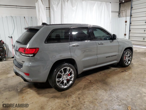 2021 Jeep Grand Cherokee SRT with VIN 1C4RJFDJ5MC667774, listed as a Copart auction lot 42484435 with 43,387 mi miles and Salvage Title. Bid and sale history available at carsss.com. Image 3.