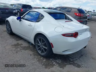 2020 Mazda MX-5 Miata Grand Touring z VIN JM1NDAM79L0411456, wystawiony jako IAAI lot #42229479 z przebiegiem 63 508 mil mil oraz . Historia ofert i sprzedaży dostępna na DreamBid. Obrazek 3.