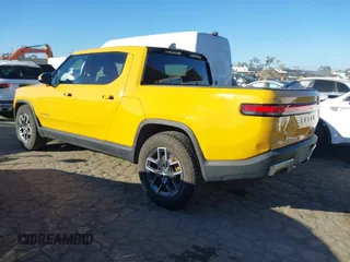 2022 Rivian R1T Adventure Package with VIN 7FCTGAAA2NN005811, listed as a IAAI auction lot 41706558 with 21,336 mi miles. Bid and sale history available at carsss.com. Image 3.