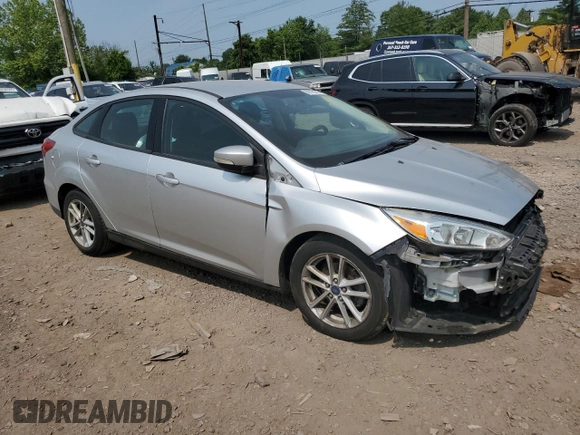 2017 Ford Focus SE with VIN 1FADP3F23HL304625, listed as a Copart auction lot 59760065 with 87,130 mi miles and Salvage title. Bid and sale history available at DreamBid. Image 4.