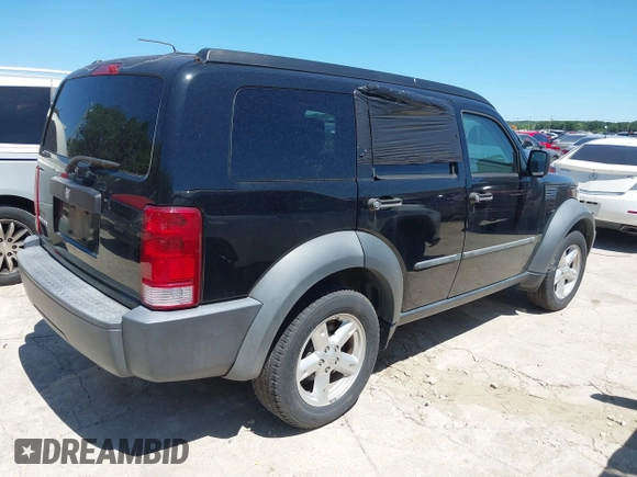 2007 Dodge Nitro SXT z VIN 1D8GT28K57W689694, wystawiony jako IAAI lot #42311713 z przebiegiem 141 344 mil mil oraz . Historia ofert i sprzedaży dostępna na DreamBid. Obrazek 4.