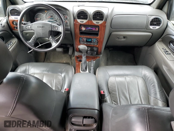 2003 GMC Envoy SLT z VIN 1GKDS13S332326838, wystawiony jako Copart lot #48888545 z przebiegiem 197 969 mil mil oraz Czysty tytuł • Clean title. Historia ofert i sprzedaży dostępna na DreamBid. Obrazek 8.
