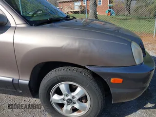 2005 Hyundai Santa Fe GLS with VIN KM8SC13D15U013890, listed as a IAAI auction lot 41917783 with 227,891 mi miles. Bid and sale history available at carsss.com. Image 13.