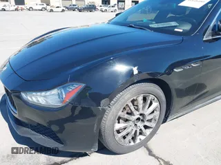 2014 Maserati Ghibli z VIN ZAM57XSA5E1091490, wystawiony jako IAAI lot #41848480 z przebiegiem 129 585 mil mil oraz . Historia ofert i sprzedaży dostępna na DreamBid. Obrazek 6.