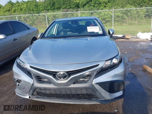 2021 Toyota Camry SE Nightshade with VIN 4T1G11AKXMU599663, listed as a IAAI auction lot 41902392 with 76,909 mi miles. Bid and sale history available at carsss.com. Image 12.