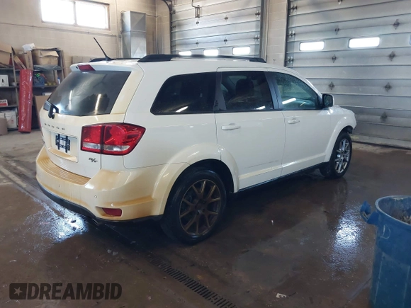 2015 Dodge Journey R/T with VIN 3C4PDDEGXFT574696, listed as a IAAI auction lot 41542460 with 153,044 mi miles and . Bid and sale history available at DreamBid. Image 4.