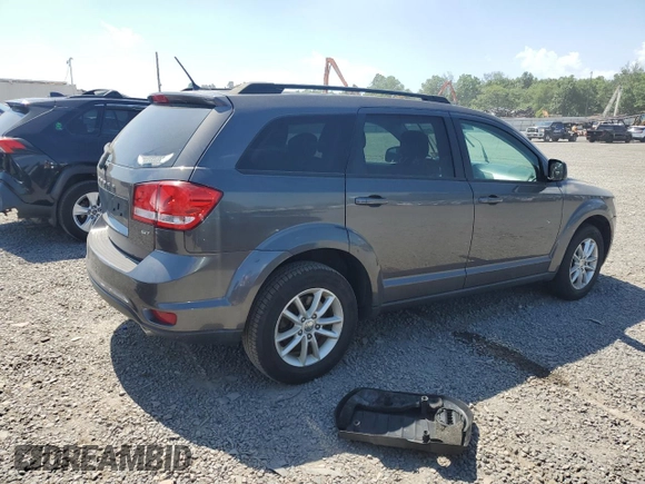 2015 Dodge Journey SXT with VIN 3C4PDDBG8FT715799, listed as a Copart auction lot 61681915 with 128,164 mi miles and Clean title. Bid and sale history available at DreamBid. Image 3.